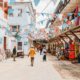 Stone Town: Local people on a street in Stone Town. Stone Town is the old part of Zanzibar City, the capital of Zanzibar, Tanzania